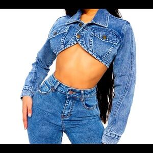 NWT crop Jean jacket. Fashion forward, attention grabbing. Dress up or down.